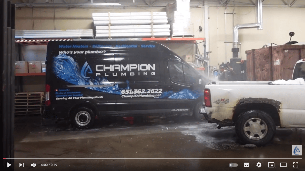 champion plumbing mn black van is being washed